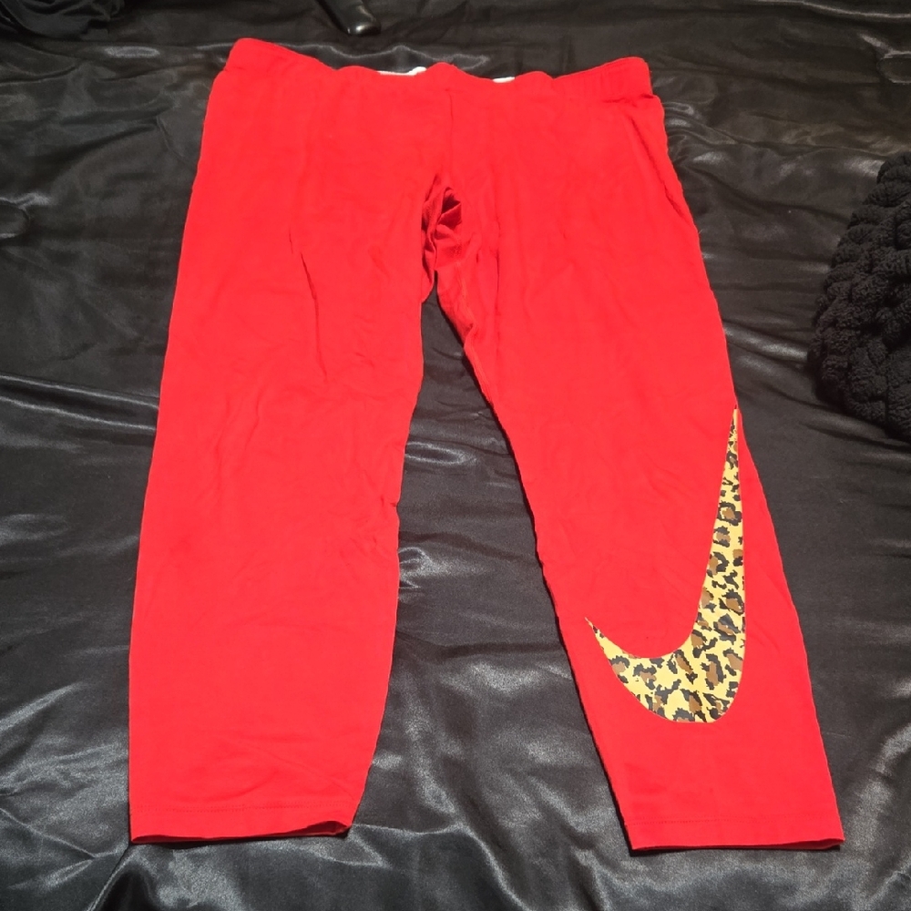 Nike Red Pants with Leopard Print Swoosh